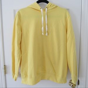 yellow pullover sweatshirt with drawstring hoodie